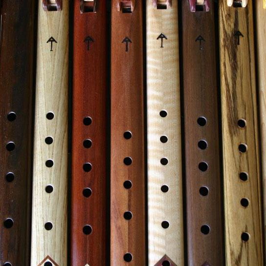 Why do you make your flutes with a flattened top instead of round like