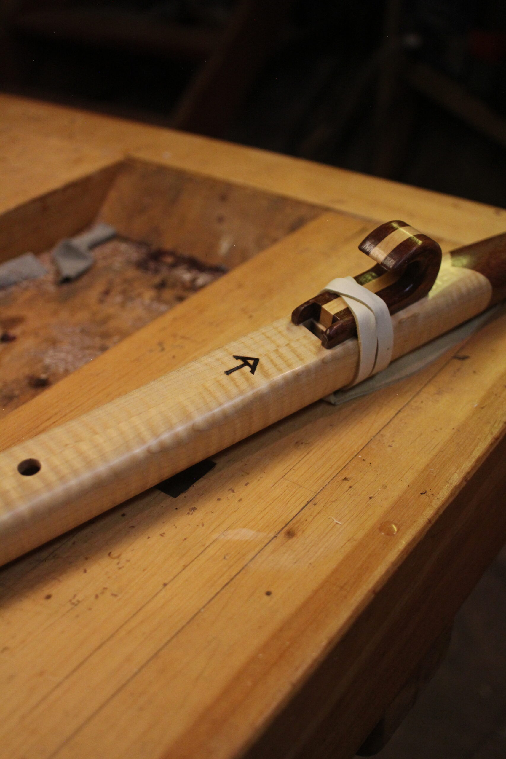 Native American style flute on workbench